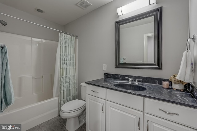 full bathroom featuring shower / tub combo with curtain, visible vents, toilet, vanity, and tile patterned flooring