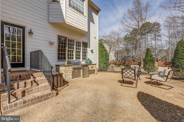 view of patio / terrace featuring fence and area for grilling