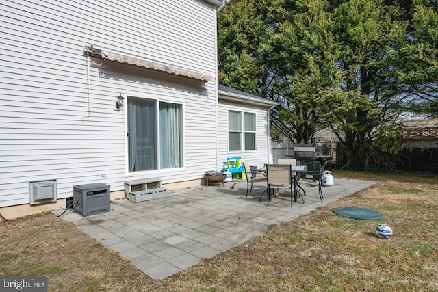 view of patio / terrace featuring fence