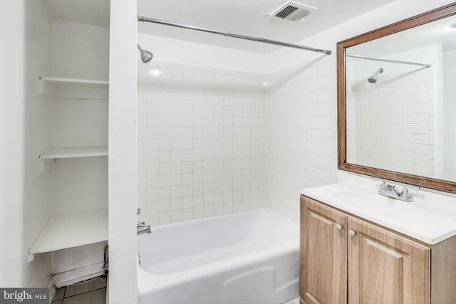 full bath with shower / washtub combination, vanity, and visible vents