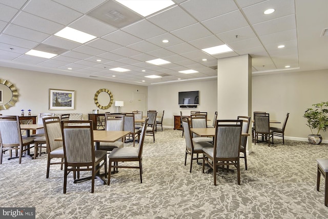 dining space featuring baseboards, recessed lighting, and light colored carpet