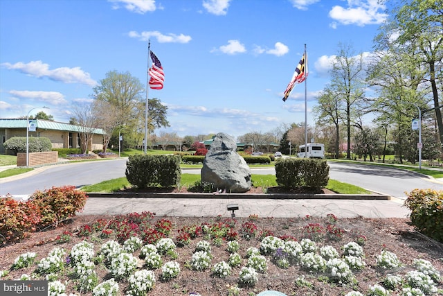 exterior space featuring curbs and sidewalks