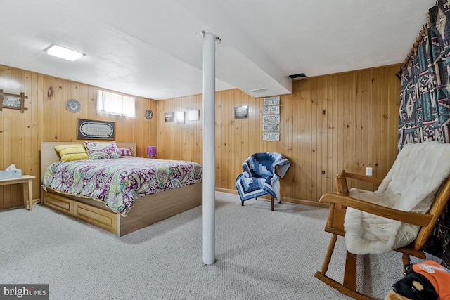 carpeted bedroom with visible vents and baseboards