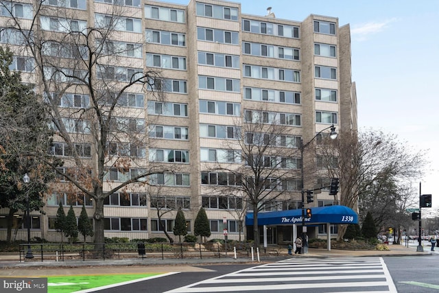 view of building exterior featuring fence