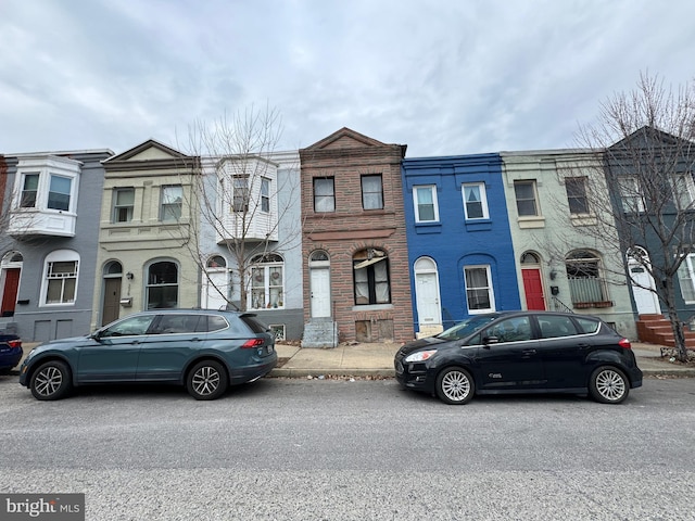 multi unit property featuring brick siding