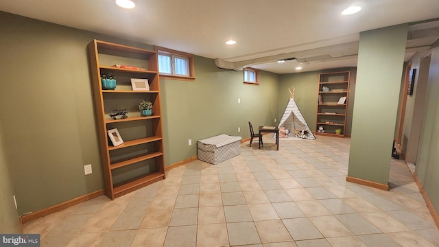 recreation room featuring recessed lighting, built in shelves, baseboards, and light tile patterned flooring