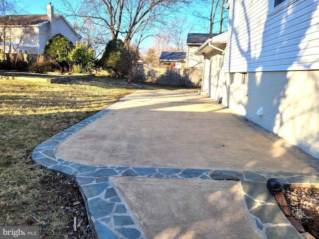 exterior space featuring fence and a patio