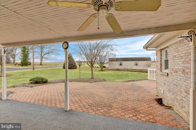 view of patio with a ceiling fan