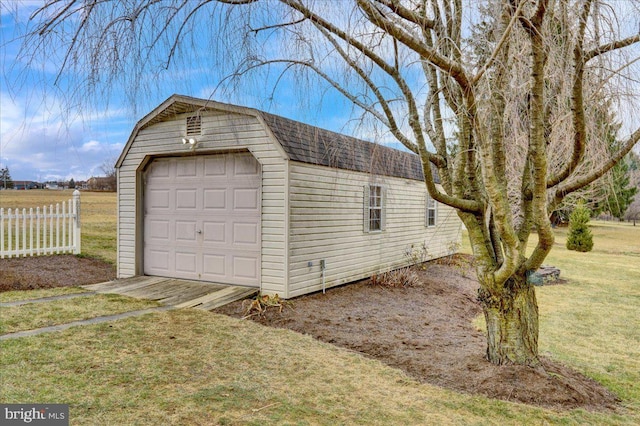 detached garage with fence