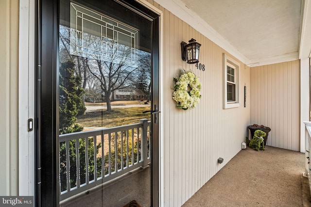 doorway to property with a porch