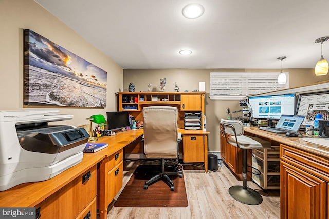 home office featuring light wood-style flooring and recessed lighting