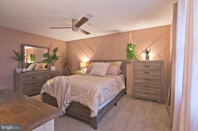 bedroom featuring ceiling fan and light colored carpet