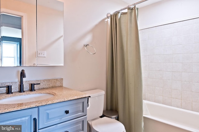 full bath with toilet, shower / tub combo with curtain, and vanity