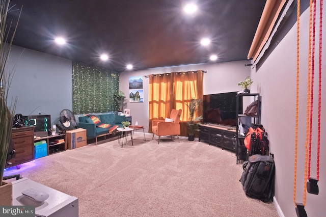 living area featuring recessed lighting and carpet flooring