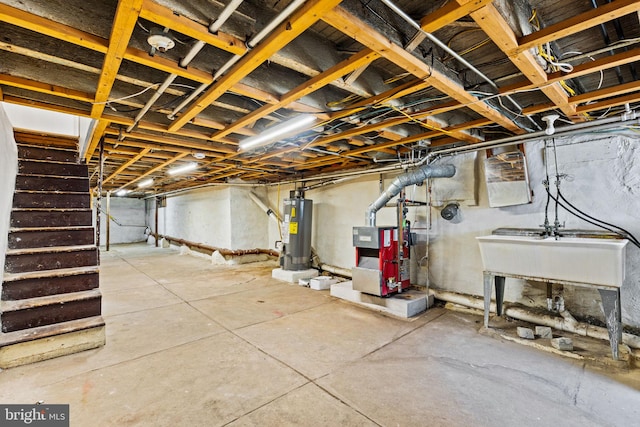 unfinished basement featuring a heating unit, stairway, a sink, and electric water heater