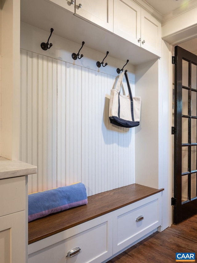 mudroom featuring dark wood finished floors