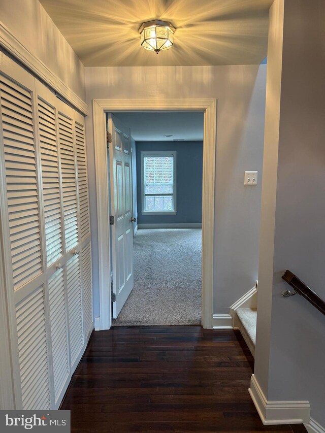 2114 Split Creek Ln, Hanover, MD 21076 - hallway with dark wood finished floors and baseboards