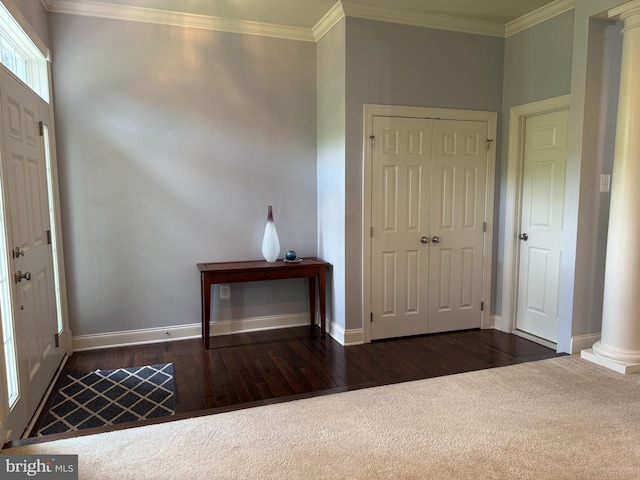 2114 Split Creek Ln, Hanover, MD 21076 - carpeted entryway featuring ornate columns, ornamental molding, and wood finished floors