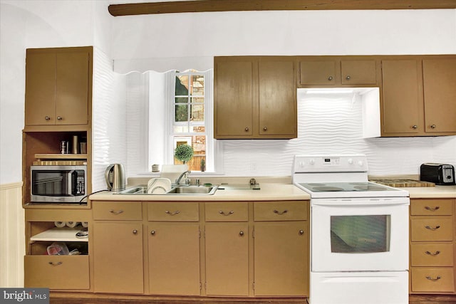 kitchen featuring white electric range oven, stainless steel microwave, a sink, light countertops, and backsplash