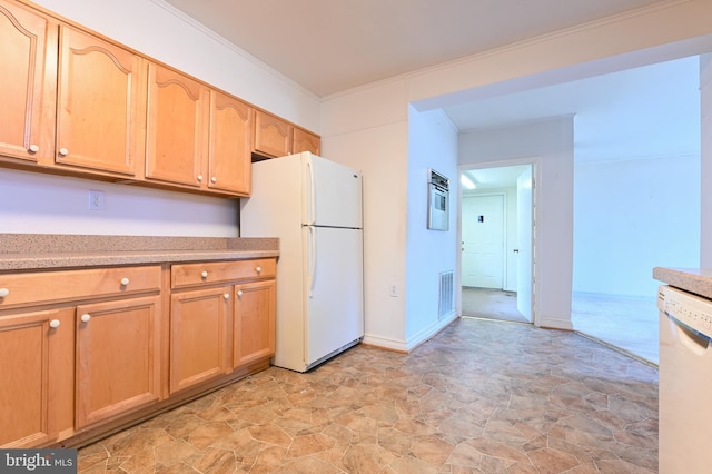 kitchen featuring white appliances, visible vents, ornamental molding, light countertops, and light brown cabinetry