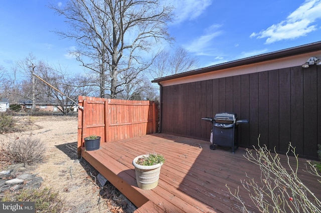 wooden deck featuring fence and grilling area