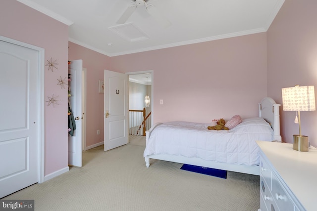 bedroom featuring attic access, light carpet, baseboards, and ornamental molding