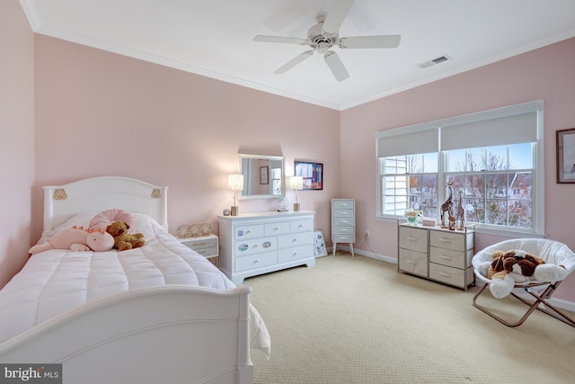 bedroom with visible vents, ornamental molding, baseboards, light colored carpet, and ceiling fan