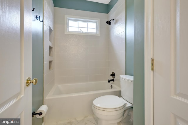 full bathroom with marble finish floor, toilet, and shower / tub combination