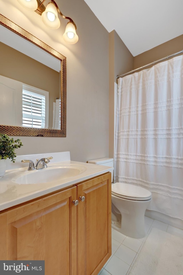 full bath with tile patterned flooring, toilet, vanity, and a shower with curtain