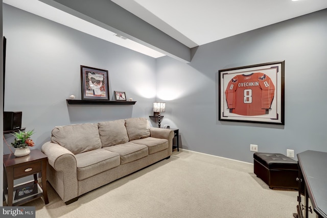 living area with beam ceiling, visible vents, baseboards, and carpet