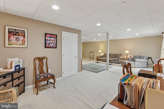 sitting room with baseboards, a drop ceiling, carpet, and recessed lighting