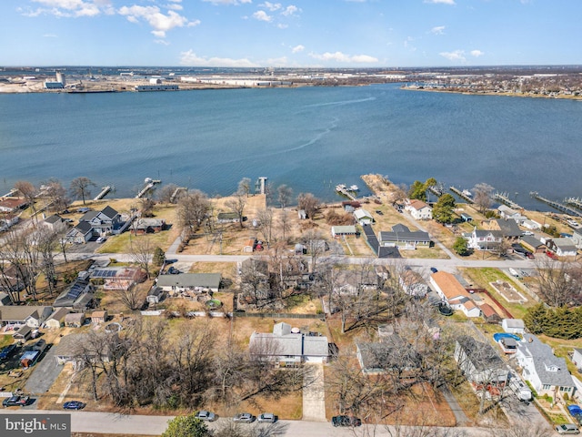 aerial view with a water view and a residential view