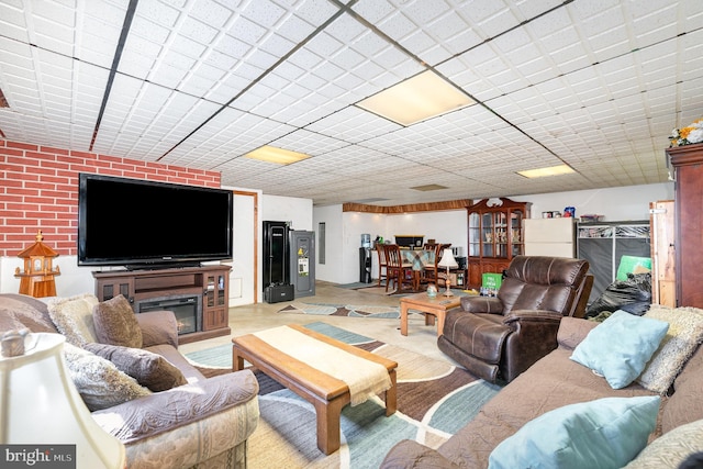 living area with a glass covered fireplace