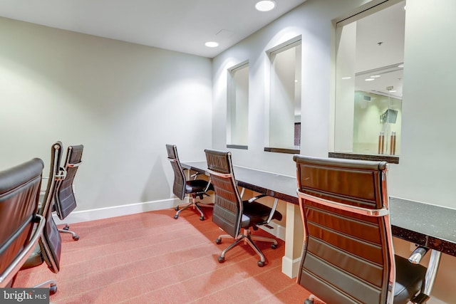 office with baseboards and recessed lighting