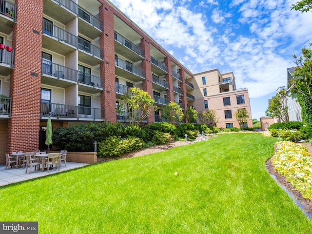 surrounding community featuring a lawn