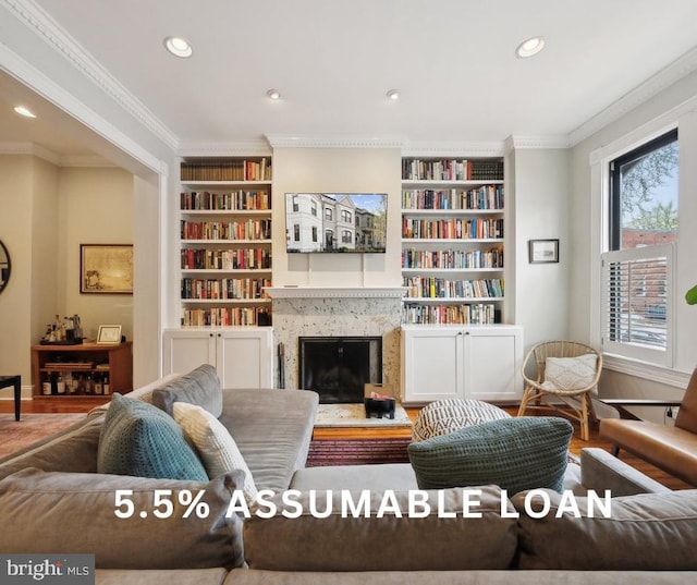 1619 Marion St NW, Washington, DC 20001 - living room featuring built in shelves, recessed lighting, crown molding, wood finished floors, and a fireplace