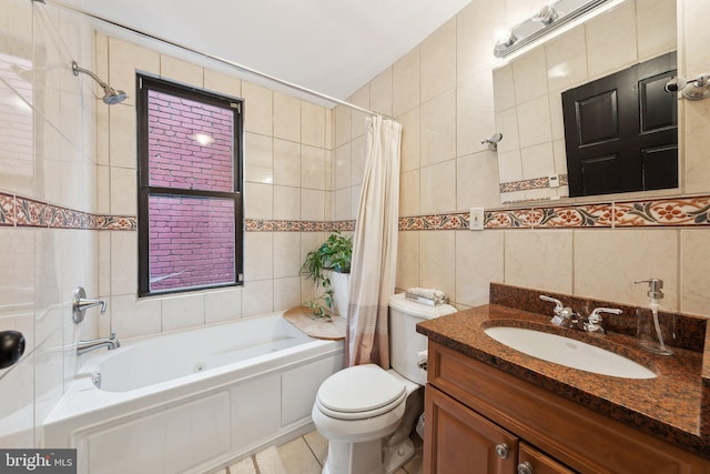 1619 Marion St NW, Washington, DC 20001 - bathroom with tile walls, shower / tub combo with curtain, vanity, toilet, and tile patterned floors