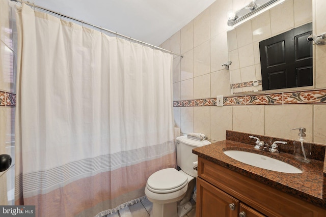 1619 Marion St NW, Washington, DC 20001 - bathroom with toilet, tile walls, vanity, tile patterned floors, and curtained shower