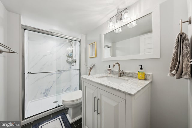 1619 Marion St NW, Washington, DC 20001 - bathroom with vanity, toilet, and a marble finish shower