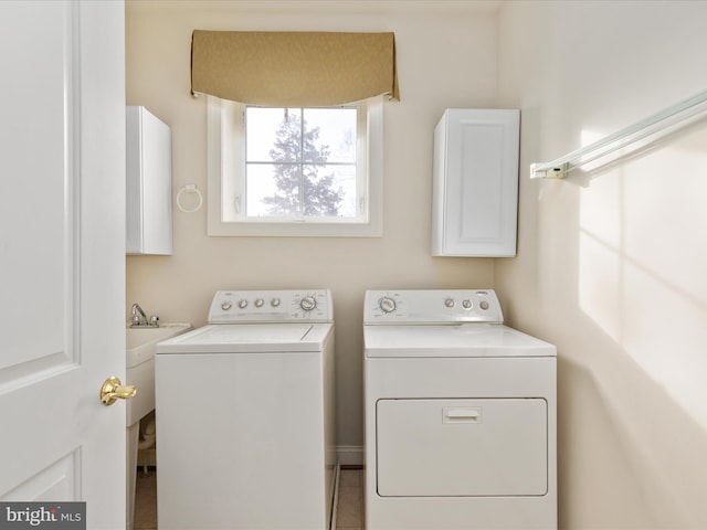 laundry area featuring laundry area and washer and clothes dryer