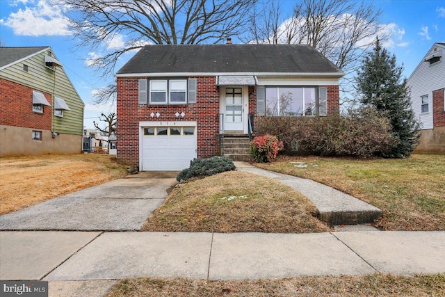 view of front of home featuring driveway, brick siding, a front lawn, and an attached garage