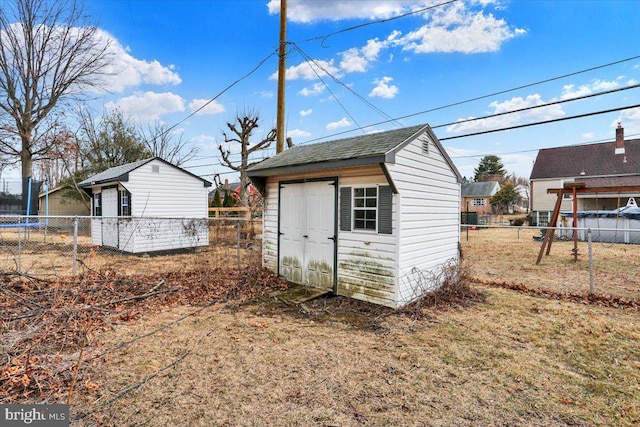 view of shed featuring a fenced backyard