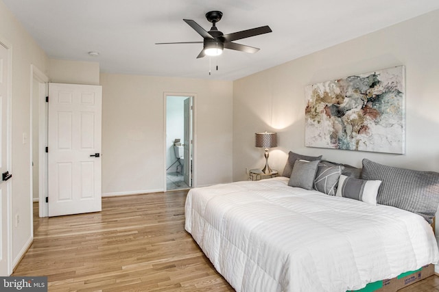 bedroom with baseboards, light wood finished floors, and ceiling fan