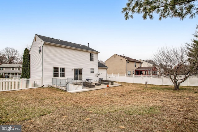 back of property featuring a patio area, a fenced backyard, and a yard