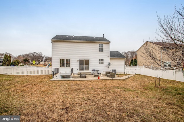 back of house featuring a patio area, a lawn, entry steps, and a fenced backyard