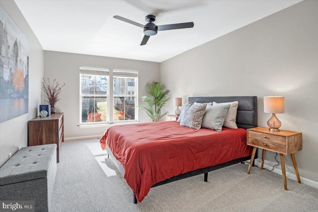 bedroom featuring carpet flooring, a ceiling fan, and baseboards