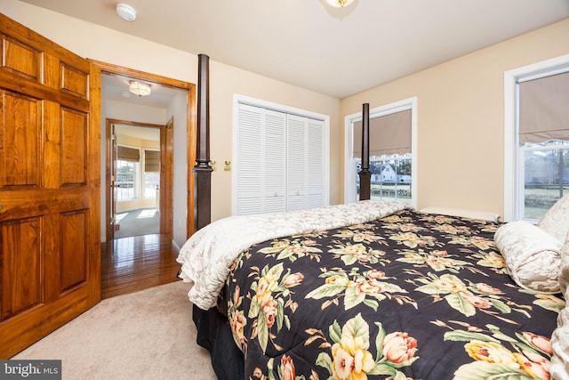 carpeted bedroom featuring a closet