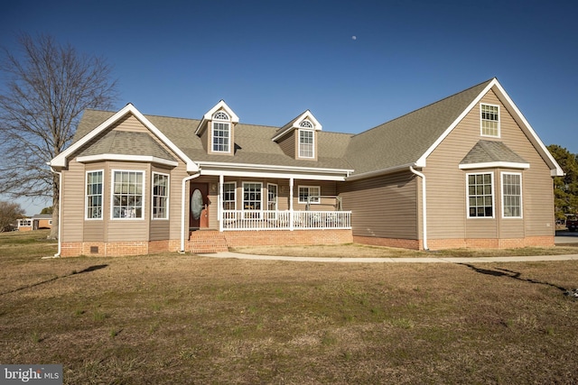 view of front facade featuring crawl space, a porch, a front yard, and roof with shingles