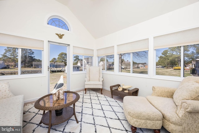 sunroom / solarium with vaulted ceiling