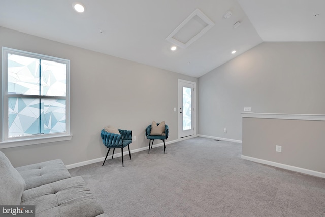 sitting room with carpet floors, recessed lighting, attic access, vaulted ceiling, and baseboards